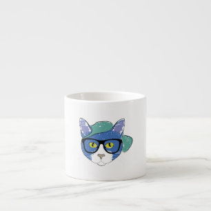 YELLOW-EYED CAT IN BLACK GLASSES AND GREEN CAP ESPRESSO CUP