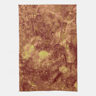 Yellow flower against leaf camouflage pattern tea towel