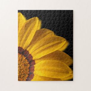 Yellow flower on black background jigsaw puzzle