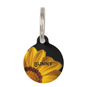 Yellow flower on black background pet tag