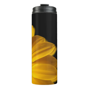 Yellow flower on black background thermal tumbler