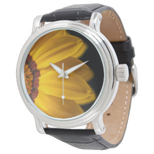 Yellow flower on black background watch