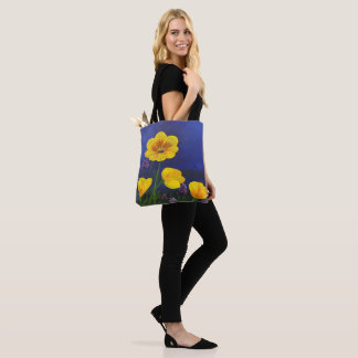 Yellow flowers on an all over print  tote bag