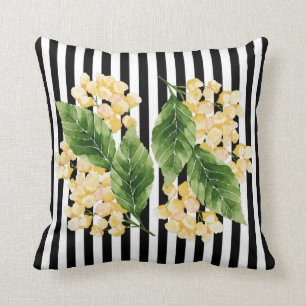 Yellow flowers on black and white stripes cushion