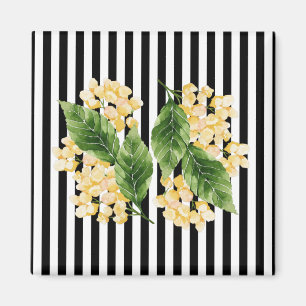 Yellow flowers on black and white stripes magnet