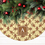 Yellow Gingerbread Man Monogram Christmas Brushed Polyester Tree Skirt<br><div class="desc">Brighten up your holiday decor with this cheerful yellow gingerbread man Christmas tree skirt. Featuring an adorable gingerbread man pattern on a warm yellow background, this tree skirt brings a unique, cosy charm to any Christmas display. Personalise it with your family monogram for a one-of-a-kind festive accent that celebrates the...</div>
