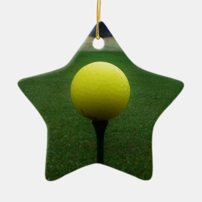 Yellow Golf Ball on a mountain golf course Ceramic Ornament (Front)