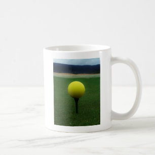 Yellow Golf Ball on a mountain golf course Coffee Mug
