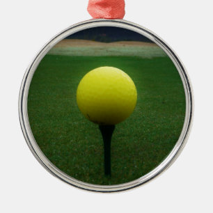 Yellow Golf Ball on a mountain golf course Metal Ornament
