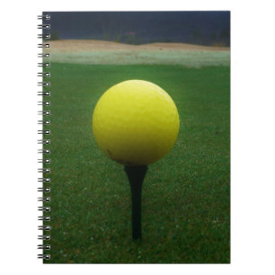 Yellow Golf Ball on a mountain golf course Notebook