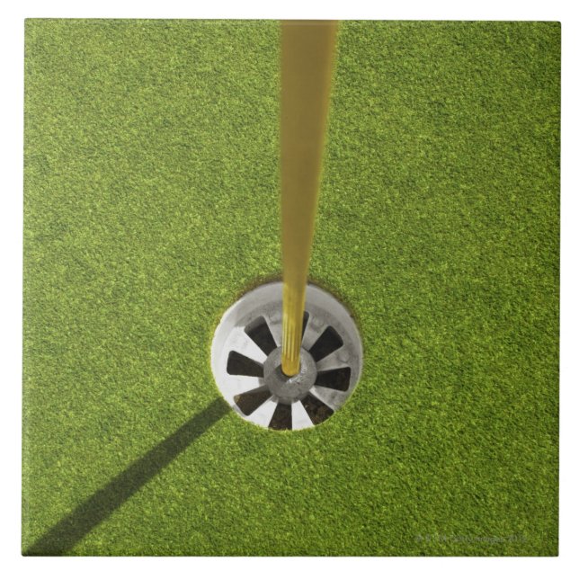 Yellow golf flag pole and hole tile (Front)