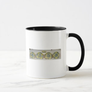 Yellow ground dishes painted in underglaze mug