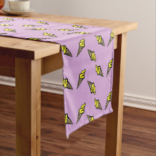 Yellow ice cream on purple short table runner
