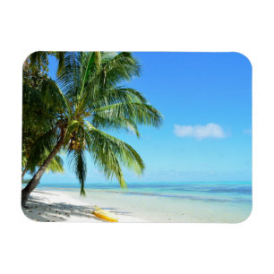 Yellow kayak on a beach rectangular magnet