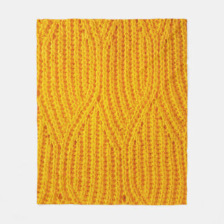 Yellow knitted surface textile material background fleece blanket