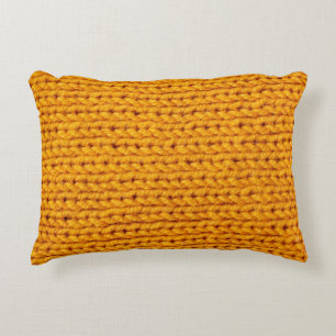 Yellow knitted wool texture background pattern wit decorative cushion