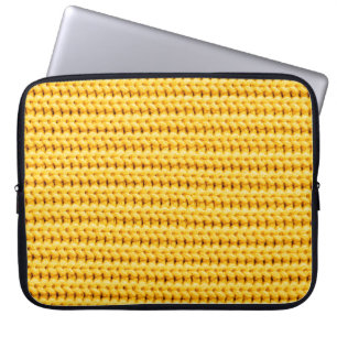 Yellow knitted woollen fabric background laptop sleeve