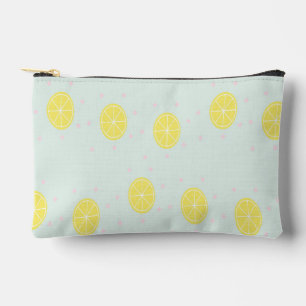Yellow lemon slices on blue accessory pouch