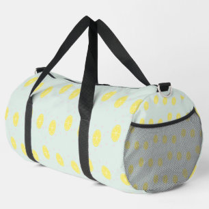 Yellow lemon slices on blue duffle bag