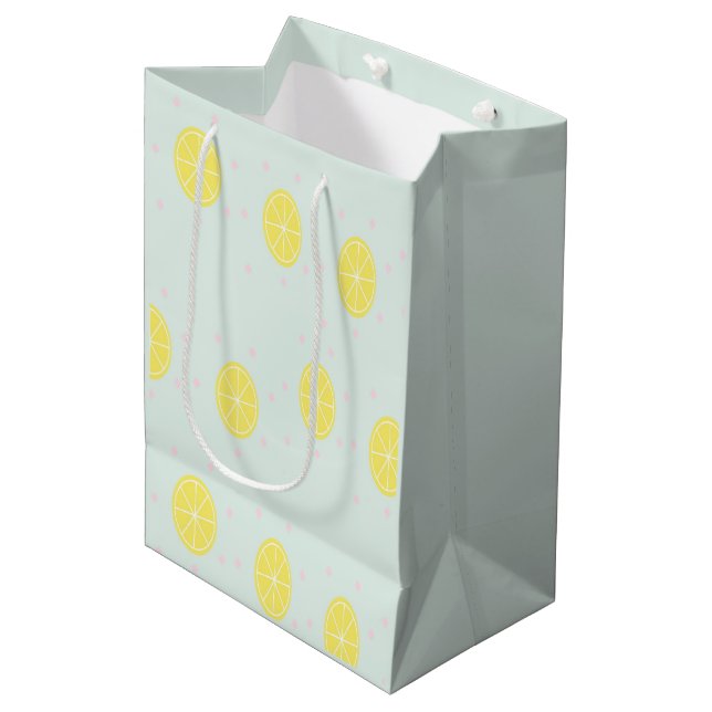 Yellow lemon slices on  blue medium gift bag (Front Angled)