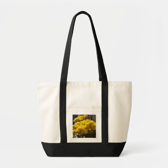 Yellow marigolds bask in sunlight tote bag (Front)
