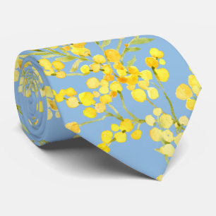 Yellow mimosa flowers on blue tie