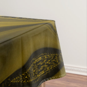 Yellow or gold curves in brown image. tablecloth
