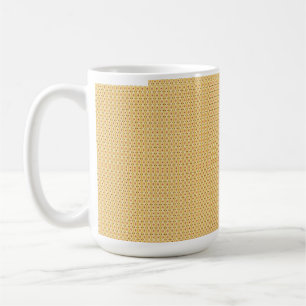 Yellow, orange, and brown sheets of wrapping paper coffee mug