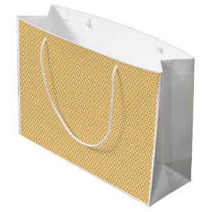 Yellow, orange, and brown sheets of wrapping paper large gift bag