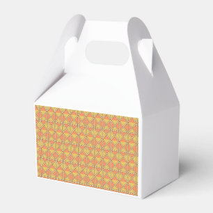 Yellow, orange, and brown wrapping paper sheets ar favour box