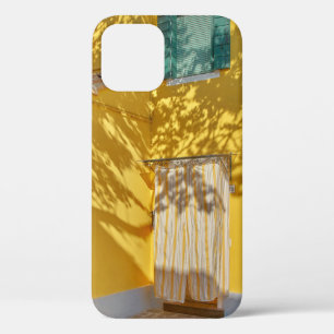 Yellow painted concreted building iPhone 12 case