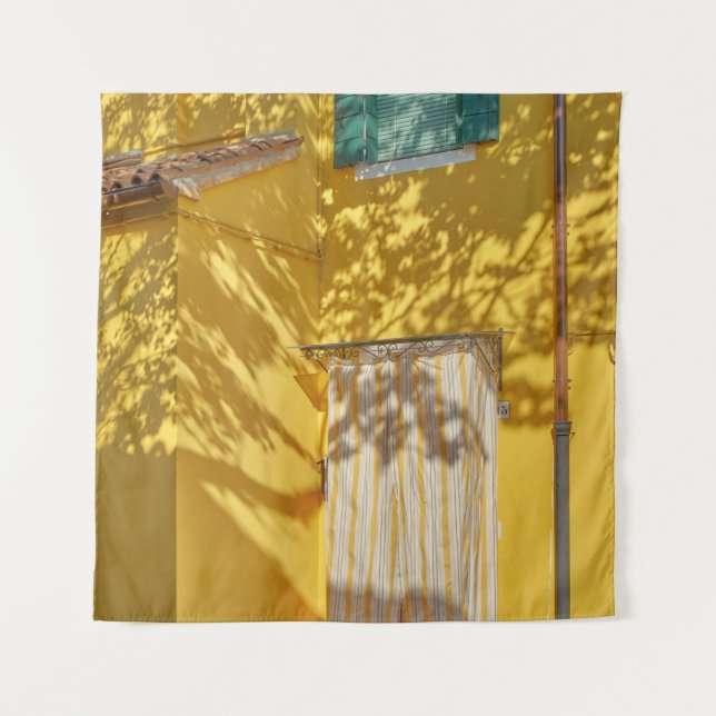 Yellow painted concreted building tapestry (Front)