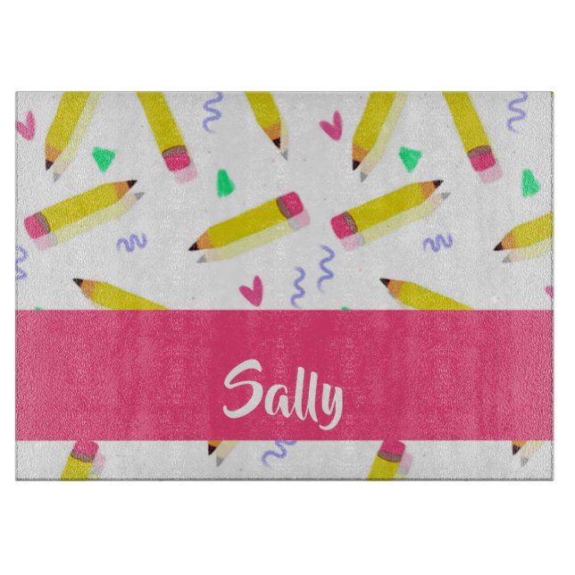 Yellow pencils and scrabbles on white cutting board (Front)