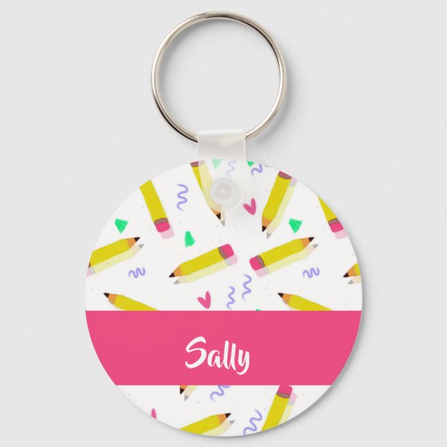 Yellow pencils and scrabbles on white key ring (Front)