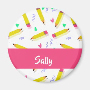 Yellow pencils and scrabbles on white magnet