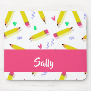 Yellow pencils and scrabbles on white mouse pad