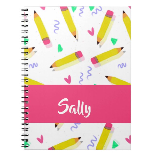Yellow pencils and scrabbles on white notebook (Front)