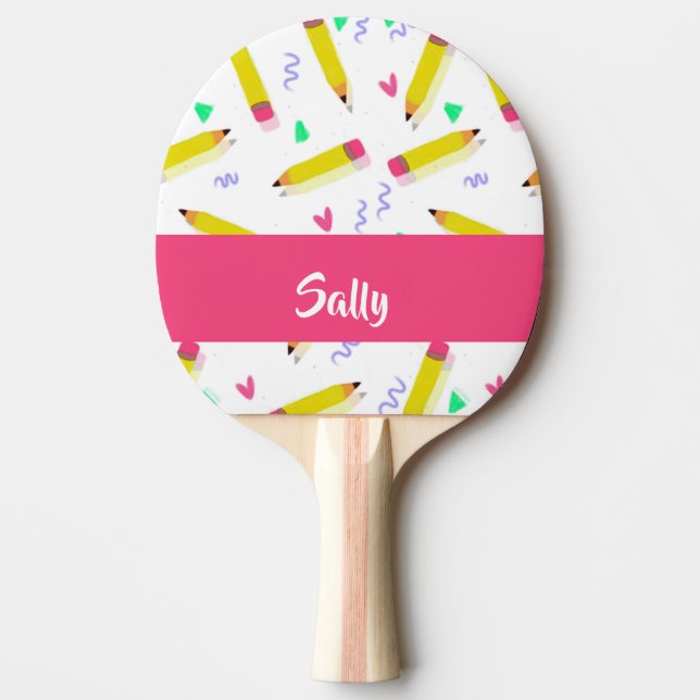 Yellow pencils and scrabbles on white ping pong paddle (Front)