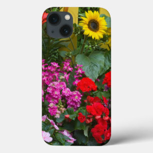 Yellow picket fence with flower garden in iPhone 13 case