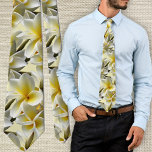 Yellow Plumeria Flowers Tropical Wedding Tie<br><div class="desc">Yellow plumeria flowers tie for the groom and groomsmen, or wear to a Hawaiian wedding. A full pattern of frangipani blossoms with buds in white, yellow and green colors covers this necktie. Each open flower is golden yellow at the center fading to white at the edges. The fun, bold, floral...</div>