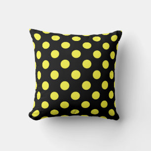 Yellow polka dots on black backgound cushion