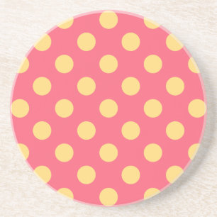 Yellow polka dots on coral coaster
