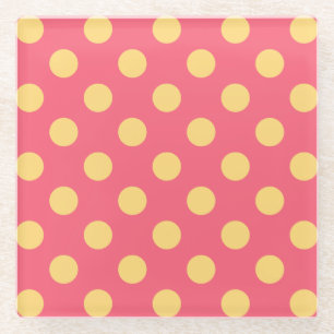 Yellow polka dots on coral glass coaster