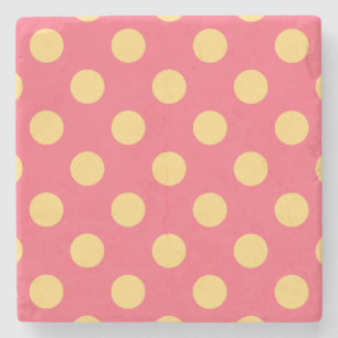Yellow polka dots on coral stone coaster