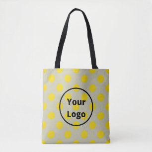 Yellow polka dots on tan tote bag