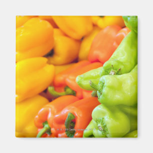 Yellow, red and green pepper on sale at farmer's magnet