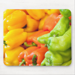 Yellow, red and green pepper on sale at farmer's mouse pad