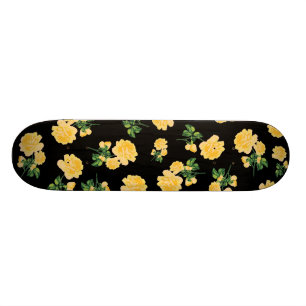 Yellow roses on black skateboard