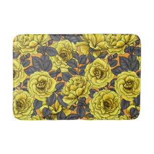 Yellow roses with grey leaves on orange bath mat