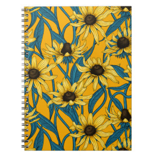 Yellow Rudbekia on yellow Notebook